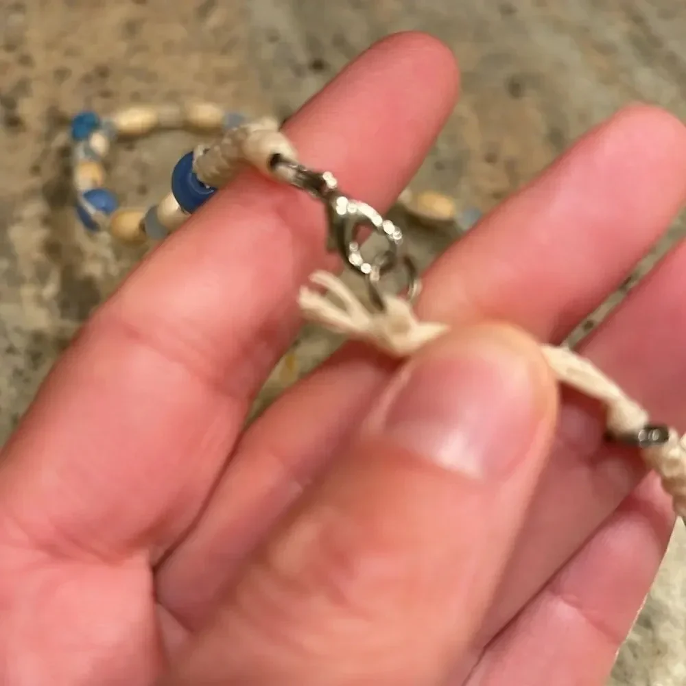 Kids beaded necklace with a silver turtle at the bottom of the necklace